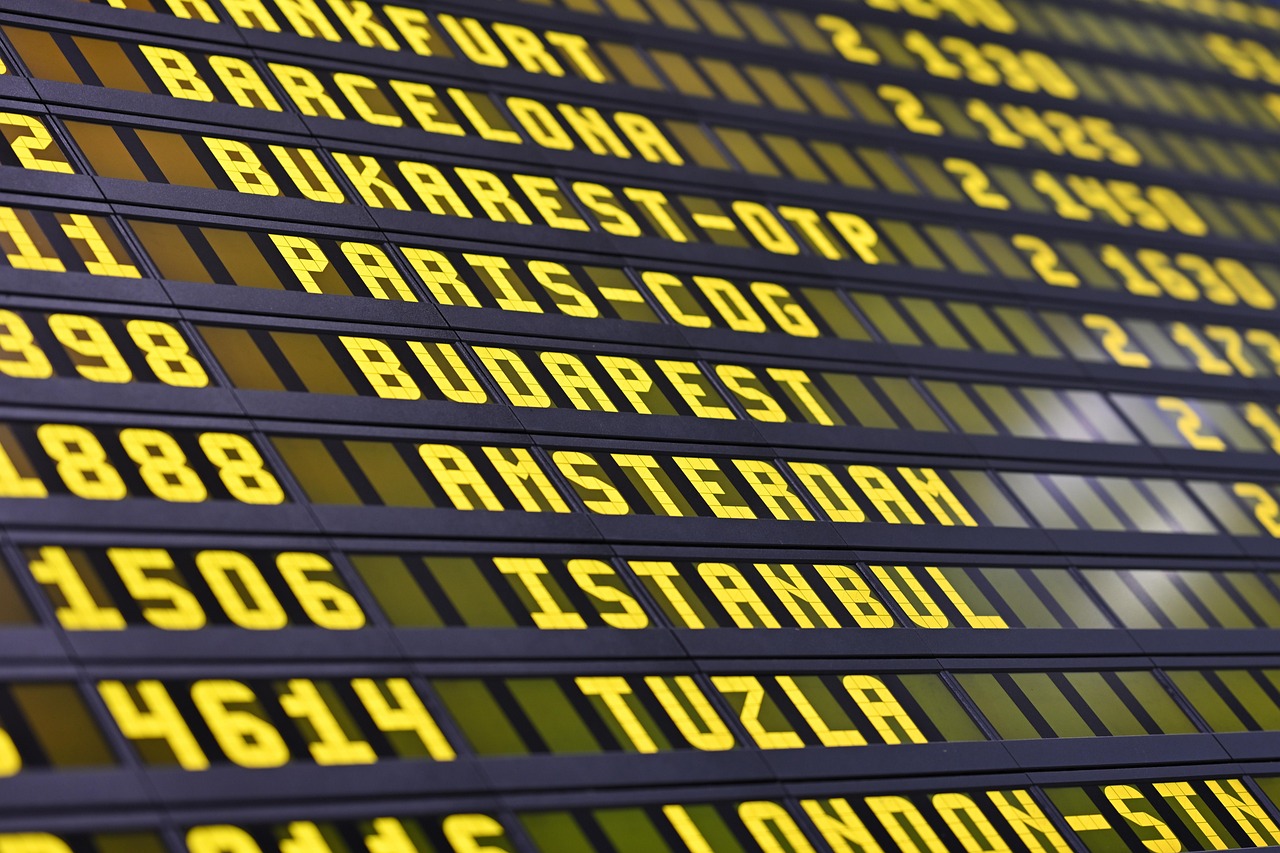 Canada eTA Eligible Countries: The Full List and How It Works: international airport departures board listing destination cities